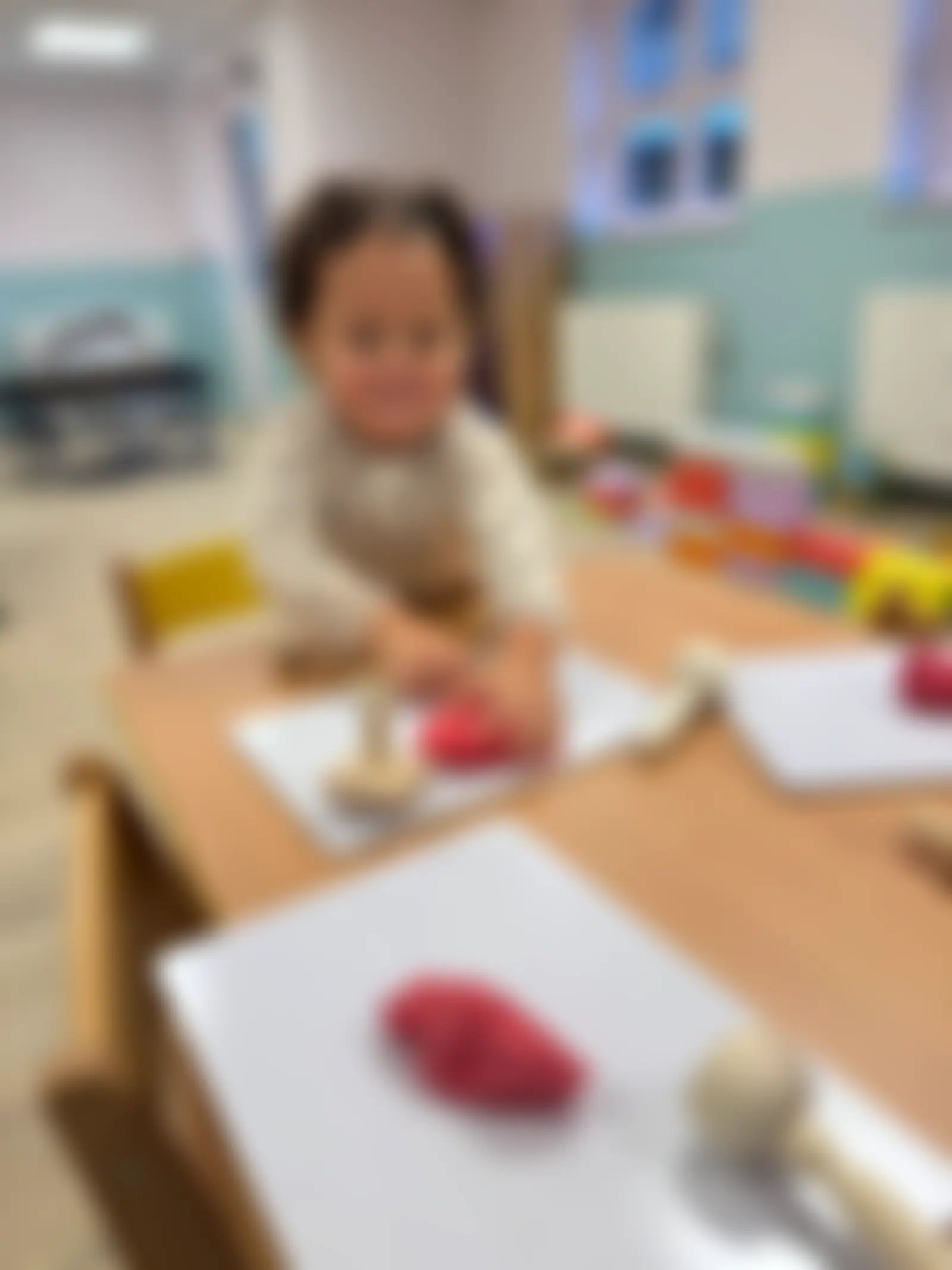 Playdough and rolling pins at the fine-motor table